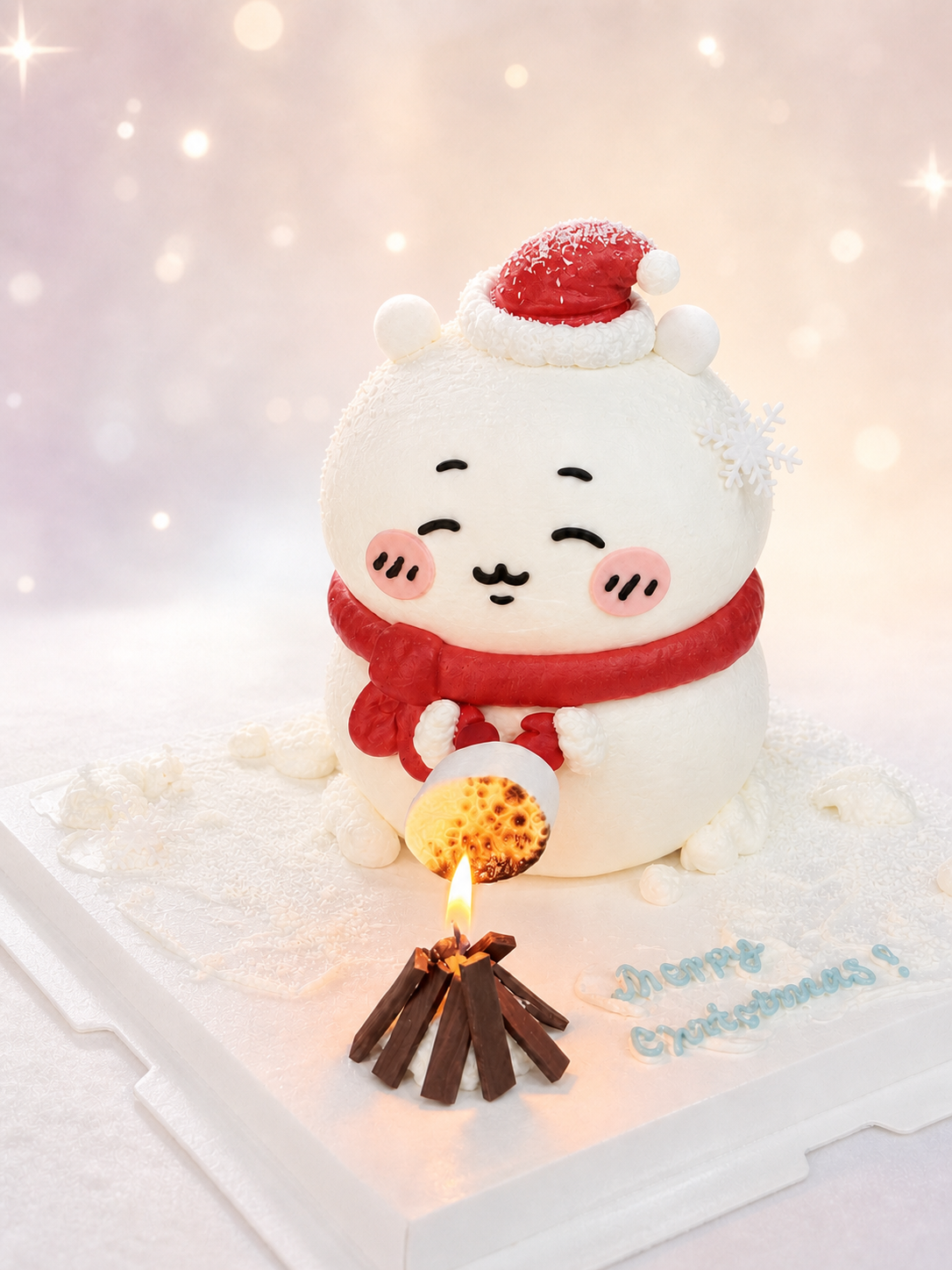 戴着圣诞帽和红围巾、烤着棉花糖的吉伊卡哇造型生日蛋糕